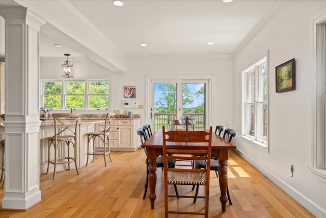 553 White Oak Rd, Stamping Ground, KY 40379 - dining space with decorative columns, light wood finished floors, recessed lighting, ornamental molding, and a chandelier
