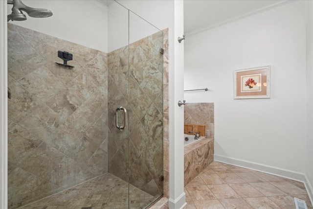 553 White Oak Rd, Stamping Ground, KY 40379 - bathroom with a garden tub, ornamental molding, a shower stall, baseboards, and tile patterned floors