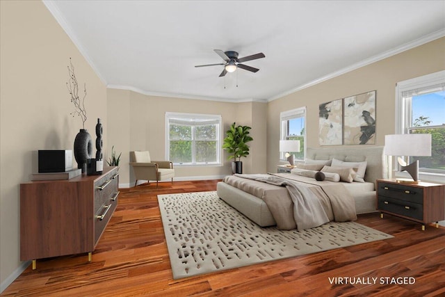 553 White Oak Rd, Stamping Ground, KY 40379 - bedroom with multiple windows, ornamental molding, wood finished floors, baseboards, and a ceiling fan