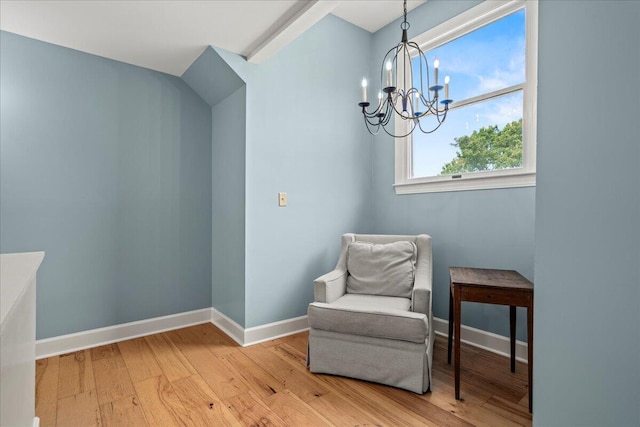 553 White Oak Rd, Stamping Ground, KY 40379 - living area with a chandelier, light wood-style floors, and baseboards
