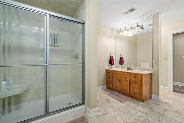 553 White Oak Rd, Stamping Ground, KY 40379 - full bath with vanity, a stall shower, baseboards, and stone finish flooring