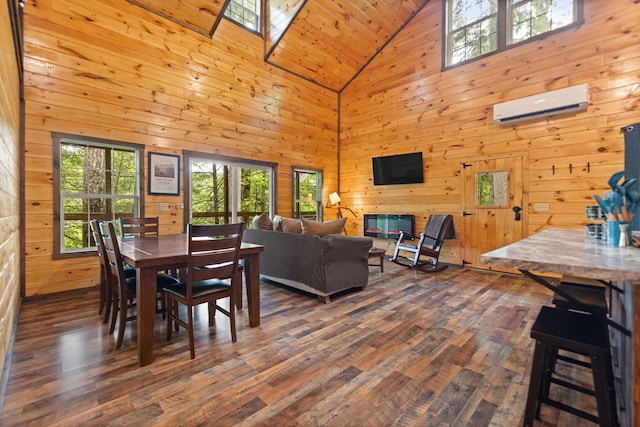 222 Muir Rd, Rogers, KY 41365 - dining space with an AC wall unit, high vaulted ceiling, dark wood-style floors, wooden walls, and wood ceiling