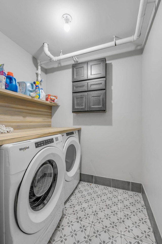 517 W Main St, Lexington, KY 40507 - washroom with separate washer and dryer and baseboards