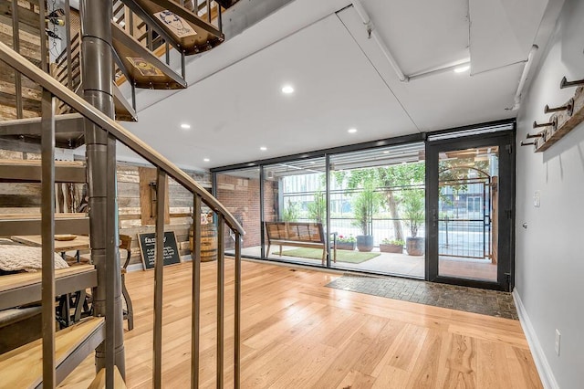 517 W Main St, Lexington, KY 40507 - interior space with a wall of windows, hardwood / wood-style floors, baseboards, and recessed lighting