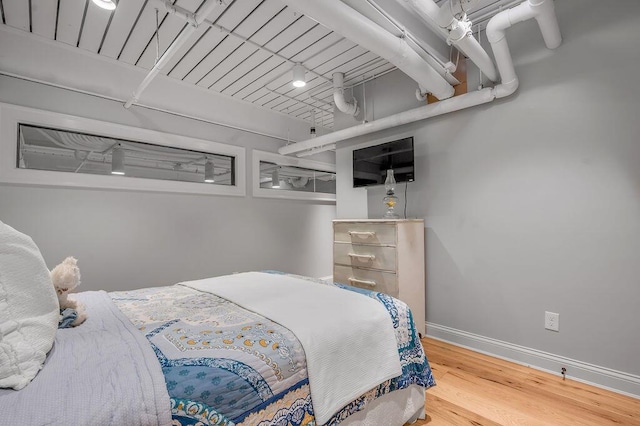 517 W Main St, Lexington, KY 40507 - bedroom with wood finished floors and baseboards