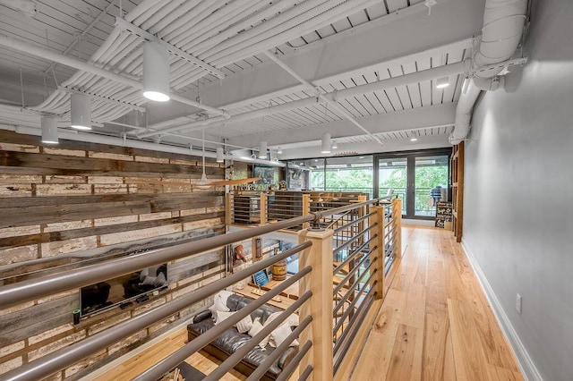 517 W Main St, Lexington, KY 40507 - hall featuring baseboards, light wood-type flooring, and an upstairs landing