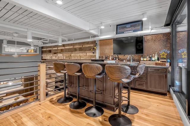 517 W Main St, Lexington, KY 40507 - indoor wet bar with light wood-type flooring and wooden ceiling