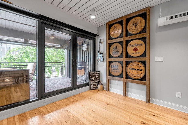 517 W Main St, Lexington, KY 40507 - entryway with wood-type flooring and baseboards
