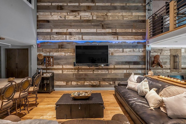 517 W Main St, Lexington, KY 40507 - living area featuring wood finished floors, wooden walls, and a towering ceiling