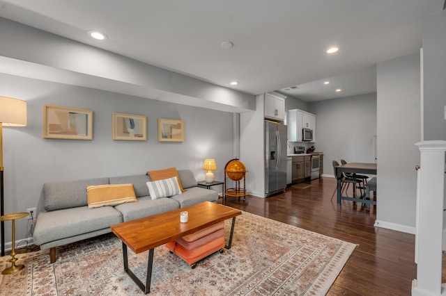 650 N Martin Luther King Blvd, Lexington, KY 40508 - living room with dark wood finished floors, baseboards, and recessed lighting
