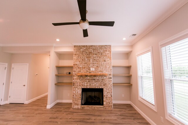 4299 Captains Ct, Lexington, KY 40513 - unfurnished living room featuring a ceiling fan, wood finished floors, a brick fireplace, baseboards, and crown molding