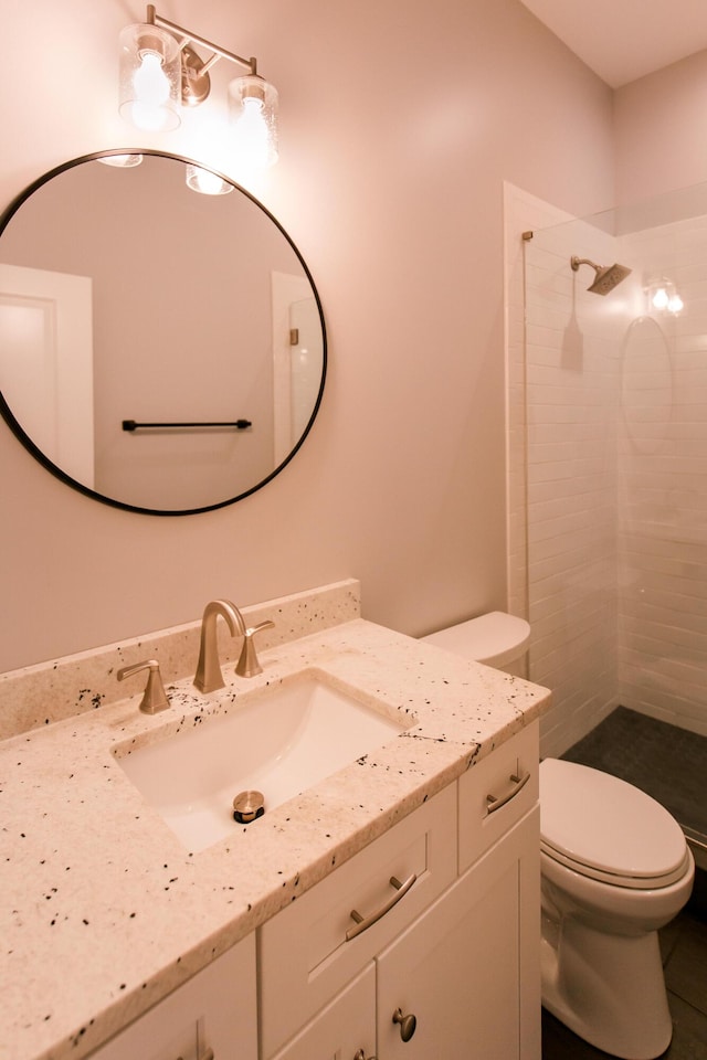4299 Captains Ct, Lexington, KY 40513 - bathroom featuring vanity, tiled shower, and toilet