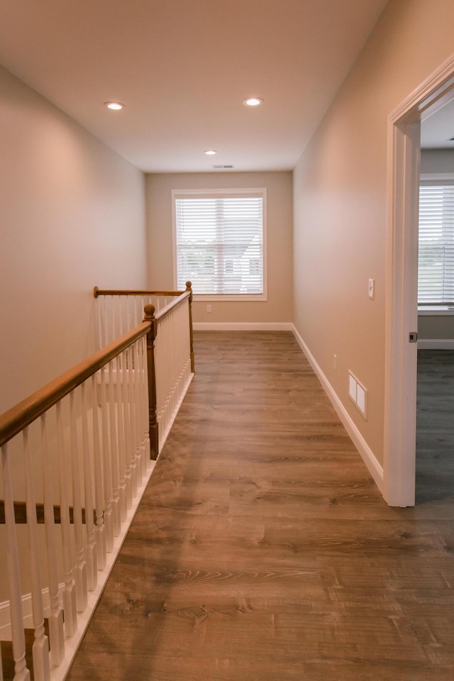 4299 Captains Ct, Lexington, KY 40513 - hall with wood finished floors, baseboards, recessed lighting, and an upstairs landing