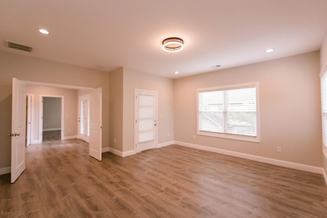 4299 Captains Ct, Lexington, KY 40513 - unfurnished room featuring wood finished floors, baseboards, and recessed lighting