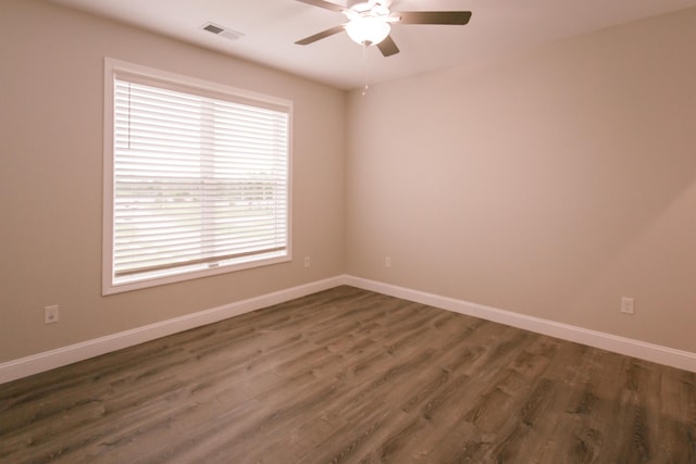 4299 Captains Ct, Lexington, KY 40513 - spare room with a ceiling fan, dark wood-style flooring, and baseboards