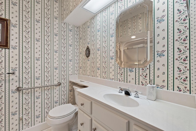 6A Charleston Greene, Danville, KY 40422 - bathroom with wallpapered walls, toilet, and vanity