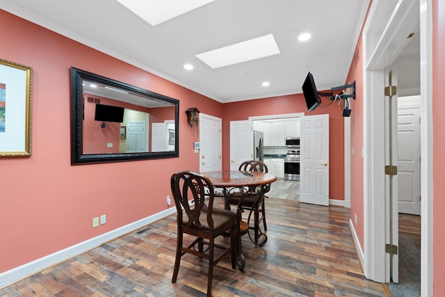 6A Charleston Greene, Danville, KY 40422 - dining room featuring a skylight, baseboards, dark wood-style flooring, ornamental molding, and recessed lighting