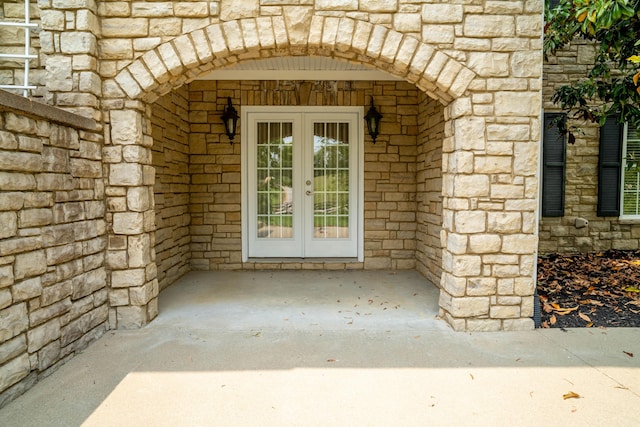 20 Walnut Hill Ct, Cynthiana, KY 41031 - view of exterior entry featuring french doors, stone siding, and brick siding