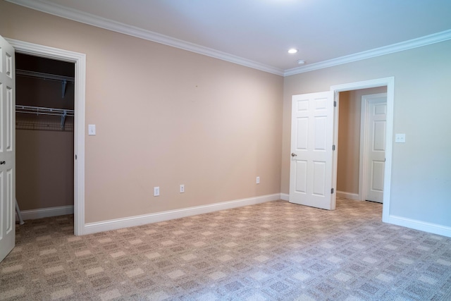 20 Walnut Hill Ct, Cynthiana, KY 41031 - unfurnished bedroom with ornamental molding, a walk in closet, baseboards, recessed lighting, and light colored carpet