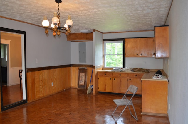 155 Greenfield Subdivision, Corbin, KY 40701 - kitchen with electric panel, a wainscoted wall, a chandelier, light countertops, and ornamental molding