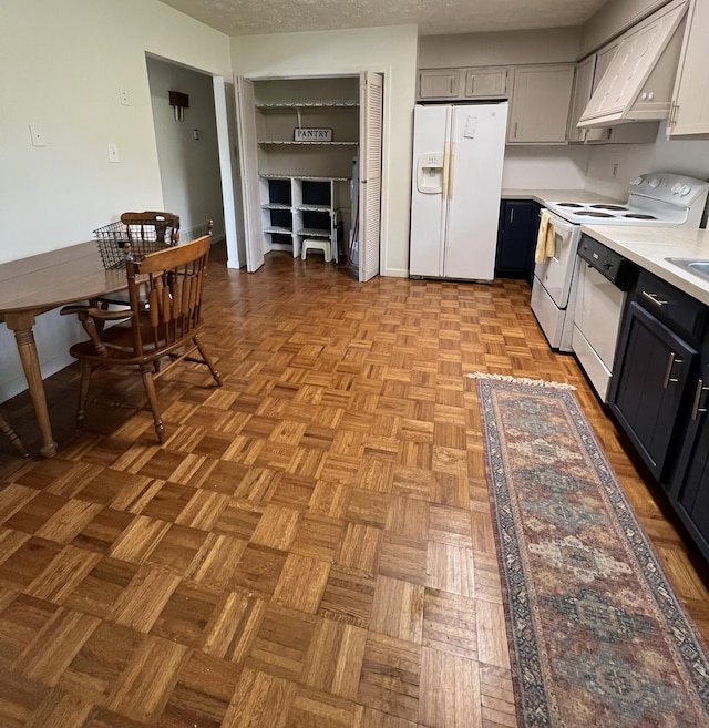 155 Greenfield Subdivision, Corbin, KY 40701 - kitchen featuring white appliances, light countertops, and custom exhaust hood