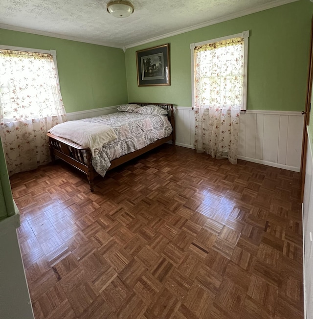 155 Greenfield Subdivision, Corbin, KY 40701 - bedroom featuring wainscoting, a textured ceiling, and ornamental molding