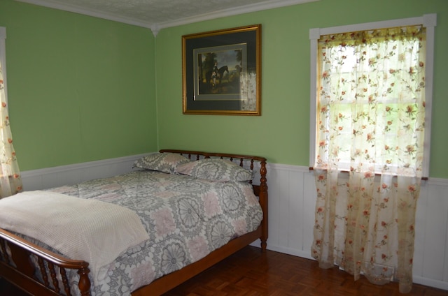 155 Greenfield Subdivision, Corbin, KY 40701 - bedroom featuring a wainscoted wall, crown molding, and a decorative wall