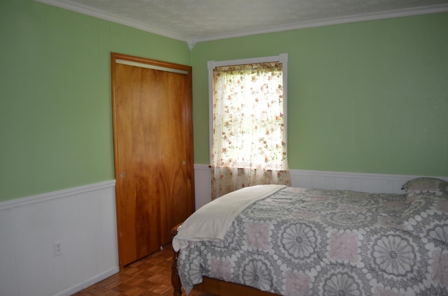 155 Greenfield Subdivision, Corbin, KY 40701 - bedroom with a wainscoted wall, a closet, and crown molding