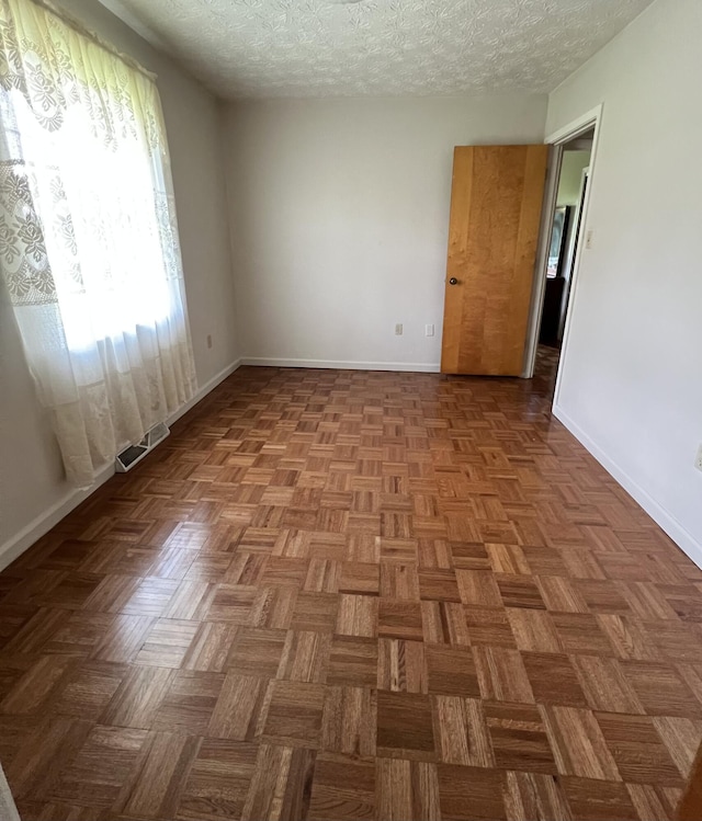 155 Greenfield Subdivision, Corbin, KY 40701 - spare room featuring baseboards and a textured ceiling
