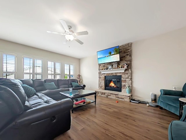 4663 Larkhill Ln, Lexington, KY 40509 - living area with wood finished floors, ceiling fan, and a stone fireplace