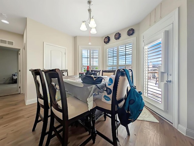 4663 Larkhill Ln, Lexington, KY 40509 - dining room with baseboards and wood finished floors