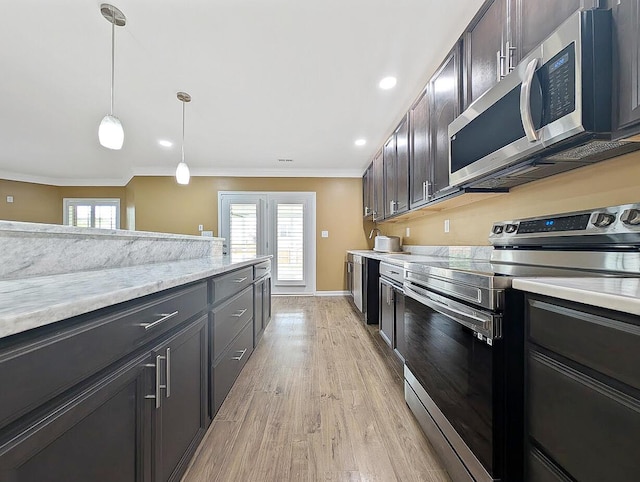 4663 Larkhill Ln, Lexington, KY 40509 - kitchen with appliances with stainless steel finishes, ornamental molding, light wood-style floors, healthy amount of natural light, and hanging light fixtures