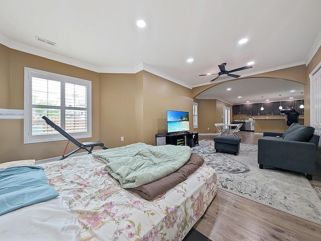 4663 Larkhill Ln, Lexington, KY 40509 - bedroom with arched walkways, wood finished floors, recessed lighting, baseboards, and crown molding