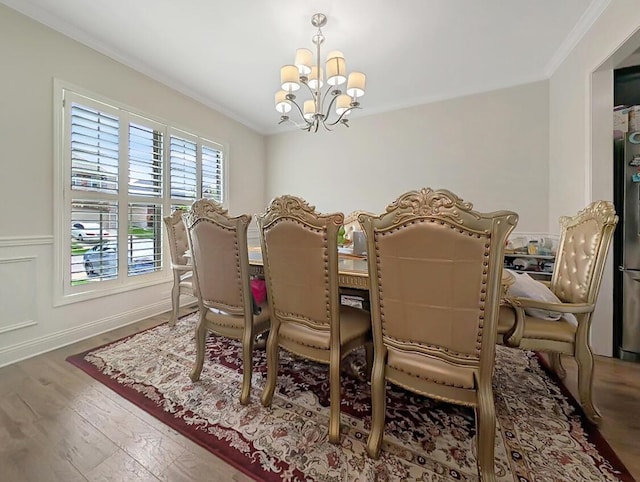 4663 Larkhill Ln, Lexington, KY 40509 - dining room featuring a chandelier, crown molding, and wood finished floors