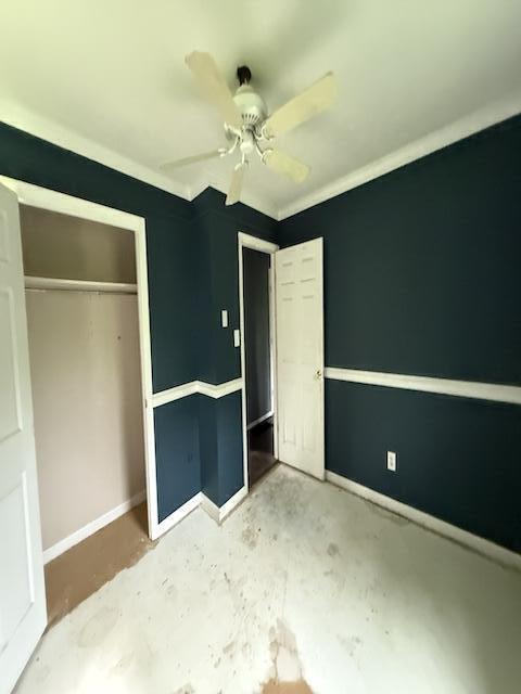 100 Ridgeway Dr, Lancaster, KY 40444 - unfurnished bedroom with baseboards, a closet, a ceiling fan, and concrete flooring