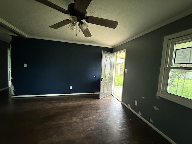 100 Ridgeway Dr, Lancaster, KY 40444 - spare room with plenty of natural light, wood finished floors, crown molding, and baseboards