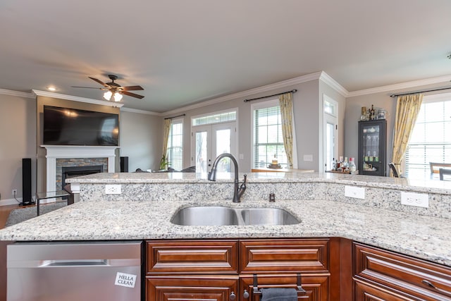 3757 Hardwood Rd, Lexington, KY 40509 - kitchen with stainless steel dishwasher, open floor plan, a sink, ornamental molding, and a ceiling fan