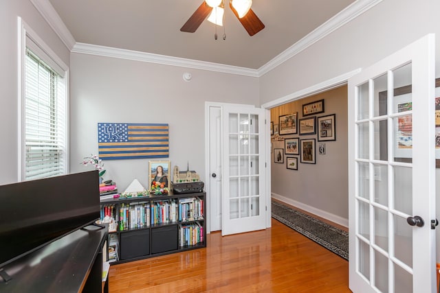 3757 Hardwood Rd, Lexington, KY 40509 - sitting room with french doors, ornamental molding, wood finished floors, ceiling fan, and baseboards