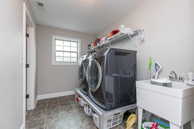 3757 Hardwood Rd, Lexington, KY 40509 - laundry area featuring washer and clothes dryer and baseboards