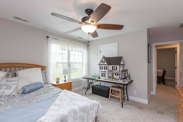 3757 Hardwood Rd, Lexington, KY 40509 - bedroom with baseboards, light carpet, and ceiling fan