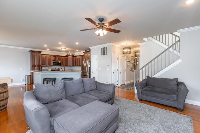 3757 Hardwood Rd, Lexington, KY 40509 - living area with stairs, ceiling fan, baseboards, recessed lighting, and wood finished floors