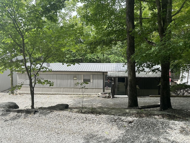 146 Chestnut St, Burnside, KY 42519 - view of front of home with metal roof