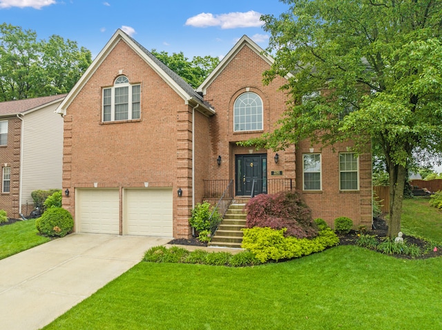 2293 Sunningdale Dr, Lexington, KY 40509 - traditional-style home with a front yard, brick siding, and a garage