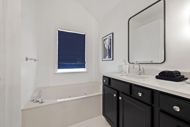2293 Sunningdale Dr, Lexington, KY 40509 - bathroom featuring vanity, a whirlpool tub, lofted ceiling, and tile patterned flooring