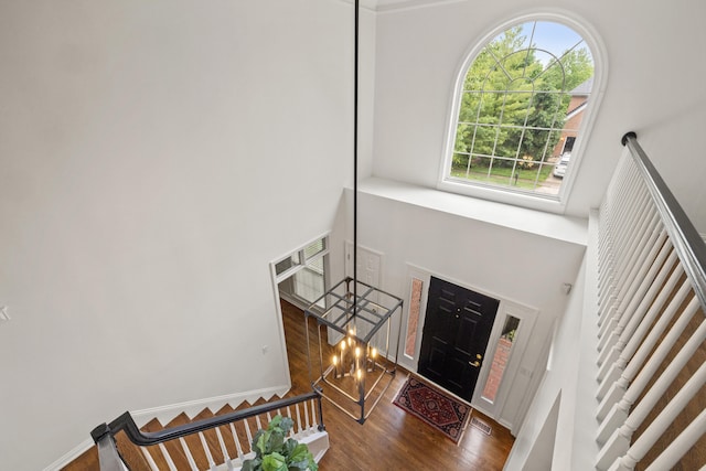 2293 Sunningdale Dr, Lexington, KY 40509 - foyer entrance featuring a high ceiling, wood finished floors, stairway, and a chandelier