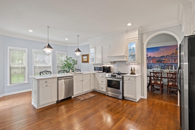 2293 Sunningdale Dr, Lexington, KY 40509 - kitchen featuring stainless steel appliances, a peninsula, a sink, white cabinetry, and recessed lighting