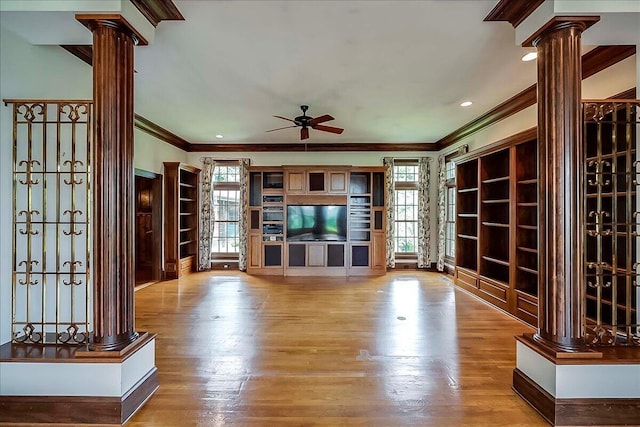 523 Leawood Dr, Frankfort, KY 40601 - unfurnished living room featuring decorative columns, ornamental molding, ceiling fan, and wood finished floors