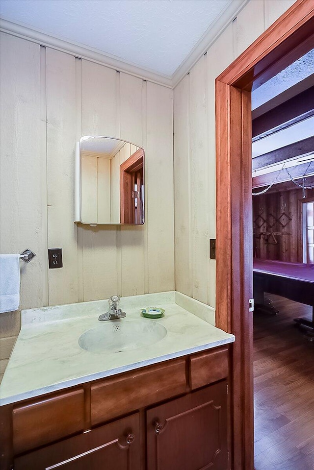 523 Leawood Dr, Frankfort, KY 40601 - bathroom with vanity, wood finished floors, and ornamental molding