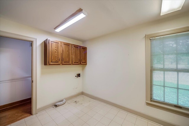 523 Leawood Dr, Frankfort, KY 40601 - laundry room featuring cabinet space, washer hookup, baseboards, and light tile patterned floors