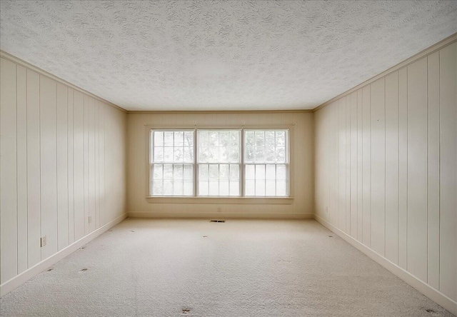 523 Leawood Dr, Frankfort, KY 40601 - carpeted spare room featuring crown molding, a textured ceiling, and baseboards